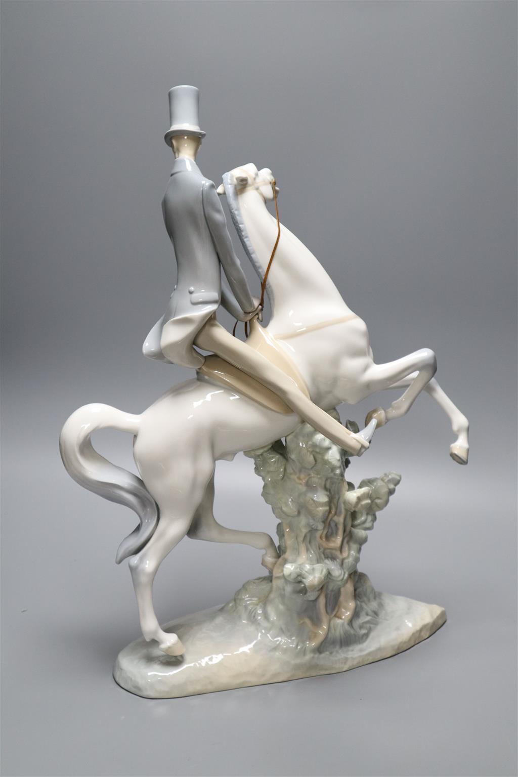 A Lladro figure of a gentleman on horse, height 50cm